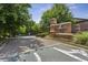 Community entrance with brick signage and landscaped grounds at 2442 Crescent Park Ct, Atlanta, GA 30339