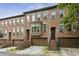 Attractive brick townhomes with private garages and inviting entrances at 2442 Crescent Park Ct, Atlanta, GA 30339