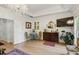 Bright main bedroom with large windows, hardwood floors, and tray ceilings at 2442 Crescent Park Ct, Atlanta, GA 30339