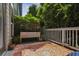Private outdoor deck with stylish decor and lush greenery at 2442 Crescent Park Ct, Atlanta, GA 30339