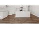 Bright, white kitchen featuring a center island with granite countertops at 109 Crooked Lake Park, Villa Rica, GA 30180