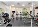 Well-equipped gym with various weight machines, treadmills, elliptical, and free weights for a comprehensive workout at 199 14Th Street Ne St # 704, Atlanta, GA 30309