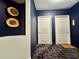 Hallway with two doors and wall decor at 199 14Th Street Ne St # 704, Atlanta, GA 30309