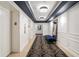 Hallway with modern lighting, elegant wall trim and geometric carpet at 199 14Th Street Ne St # 704, Atlanta, GA 30309
