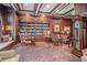 Cozy library featuring a large bookshelf, a sitting area, and an elegant grandfather clock at 199 14Th Street Ne St # 704, Atlanta, GA 30309
