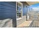 Exterior detail with a window, door and wooden porch at 2395 Saint James Nw Dr, Atlanta, GA 30318
