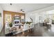A spacious living room featuring stylish decor, a fireplace, and stairs at 2395 Saint James Nw Dr, Atlanta, GA 30318