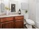 Cozy bathroom with granite countertop vanity, and a shower-tub combo at 2695 Trotters Walk Trl, Snellville, GA 30078