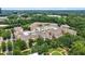 An aerial view of a large apartment complex surrounded by green trees at 10 Perimeter Summit Ne Br # 2312, Atlanta, GA 30319