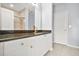 Bathroom featuring a granite countertop, white cabinets, and a separate shower area at 10 Perimeter Summit Ne Br # 2312, Atlanta, GA 30319