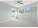 Bright, spacious bedroom featuring a ceiling fan and plenty of natural light from multiple windows at 10 Perimeter Summit Ne Br # 2312, Atlanta, GA 30319