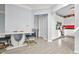 Inviting dining area with modern furnishings, adjacent to a well-equipped kitchen at 10 Perimeter Summit Ne Br # 2312, Atlanta, GA 30319