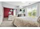 Spacious main bedroom with large windows offering natural light and a seating area at 10 Perimeter Summit Ne Br # 2312, Atlanta, GA 30319
