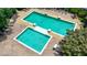 Inviting community pool area with multiple pools, lounge seating, and well-maintained surroundings at 10 Perimeter Summit Ne Br # 2312, Atlanta, GA 30319