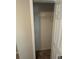 An empty closet with a single shelf and hanging rod, ready for organization and storage at 1457 Richland Road Southwest Sw Rd, Atlanta, GA 30310