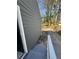 The exterior of this home shows the clean siding and a glimpse of the property's spacious surroundings at 1457 Richland Road Southwest Sw Rd, Atlanta, GA 30310