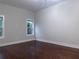 Bright bedroom with hardwood floors and natural light from windows at 1647 Walker Ave, Atlanta, GA 30337