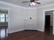 Bright living room with hardwood floors, white trim, and a decorative fireplace at 1647 Walker Ave, Atlanta, GA 30337
