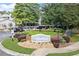 The Granville Condominium Homes exterior grounds features beautiful landscaping and mature shade trees at 620 Granville Ct, Sandy Springs, GA 30328
