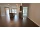 Open-concept living area with hardwood floors and a view of the kitchen at 3908 Shelleydale Dr # 39, Powder Springs, GA 30127
