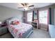 Charming bedroom featuring bright decor, plush carpet, and natural light at 3739 Silvery Way, Powder Springs, GA 30127