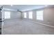 Expansive bedroom filled with natural light, neutral walls, and ceiling fan, offering comfort and relaxation at 3739 Silvery Way, Powder Springs, GA 30127