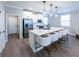 Contemporary kitchen with island seating, quartz countertops, and stainless steel appliances at 3739 Silvery Way, Powder Springs, GA 30127