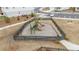 Community playground with slides, climbing structures, and a safety-conscious fenced perimeter at 3739 Silvery Way, Powder Springs, GA 30127