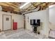 Basement featuring modern décor, shelving, and access to upper level at 658 Eight Point Ct, Suwanee, GA 30024