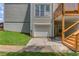 Exterior shows a garage and deck with access to the backyard at 658 Eight Point Ct, Suwanee, GA 30024