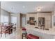 Open kitchen featuring granite countertops, stainless steel appliances, and an adjacent breakfast nook at 658 Eight Point Ct, Suwanee, GA 30024