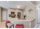 Kitchen with granite countertops, stainless steel appliances, and stylish bar stool seating at 658 Eight Point Ct, Suwanee, GA 30024