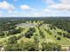 Aerial shot of golf course, lake, and city skyline in the distance at 2830 Alston Drive Se Dr, Atlanta, GA 30317