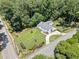 Aerial view of a blue house with a spacious, landscaped yard and a long driveway at 2830 Alston Drive Se Dr, Atlanta, GA 30317