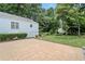 Backyard featuring a patio, lush lawn, and beautiful landscaping at 2830 Alston Drive Se Dr, Atlanta, GA 30317
