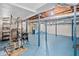Basement view of unfinished area with exercise equipment, exposed beams, and support structure at 2830 Alston Drive Se Dr, Atlanta, GA 30317