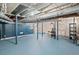 Basement view of exercise area, exposed beams, and support structure at 2830 Alston Drive Se Dr, Atlanta, GA 30317