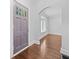 Welcoming foyer featuring hardwood floors, arched doorway, and natural light at 2830 Alston Drive Se Dr, Atlanta, GA 30317