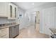 Well-maintained kitchen showcasing stainless steel appliances and stylish cabinets at 2830 Alston Drive Se Dr, Atlanta, GA 30317