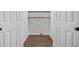 Laundry room complete with hookups, storage, and wood-look floors at 2830 Alston Drive Se Dr, Atlanta, GA 30317