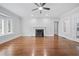 Bright living room featuring hardwood floors, a fireplace, and neutral paint at 2830 Alston Drive Se Dr, Atlanta, GA 30317