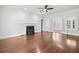 Bright living room with hardwood floors, fireplace, and sunroom access at 2830 Alston Drive Se Dr, Atlanta, GA 30317