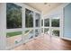 Inviting sunroom with large windows providing ample natural light and outdoor views at 2830 Alston Drive Se Dr, Atlanta, GA 30317