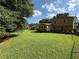 Beautiful home with a expansive backyard, mature trees and lush green lawn, perfect for Gathering enjoyment at 4402 Autumn Hill Drive, Stone Mountain, GA 30083