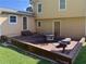 Back of house with patio and brick, seating area, great for outdoor relaxing at 4402 Autumn Hill Drive, Stone Mountain, GA 30083