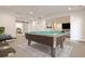 Large game room offers a pool table and additional rec space at 11760 Stratham Dr, Alpharetta, GA 30009