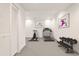 Dedicated gym space with weights and cardio equipment at 11760 Stratham Dr, Alpharetta, GA 30009