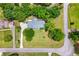 Aerial view of a well-manicured property with a spacious lawn and mature trees at 41 Ridgewood Cir, Mcdonough, GA 30252