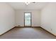 Bedroom with carpet, window allowing natural light, ceiling fan at 41 Ridgewood Cir, Mcdonough, GA 30252