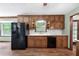 Traditional kitchen with wooden cabinets, stainless steel appliances, and light countertops at 41 Ridgewood Cir, Mcdonough, GA 30252